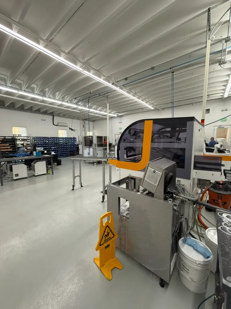The edging floor at the ITFIT lab, with parts bins alongside
